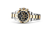 Rolex Cosmograph Daytona Oystersteel and yellow gold and black dial in Quera