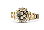 Rolex Cosmograph Daytona de oro amarillo y esfera Negro vivo y dorada engastada de diamantes en Quera