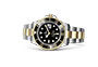 Rolex Watch Sea-Dweller Oystersteel, yellow gold and black dial in Quera