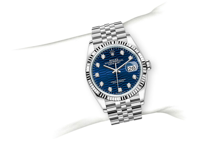 Simulación muñeca Rolex Datejust 36 Oystersteel, WHITE GOLD and Bright blue dial, fluted motif set with diamonds at Quera
